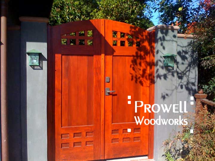 wood gate with bronze gate latch
