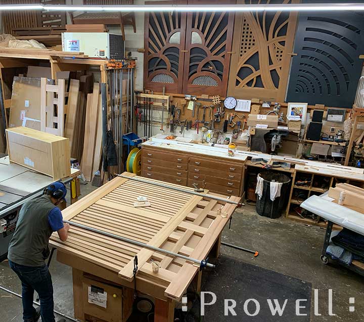 shop progress photograph showing the assembly of the lower pickets to the modern driveway gates #11-1