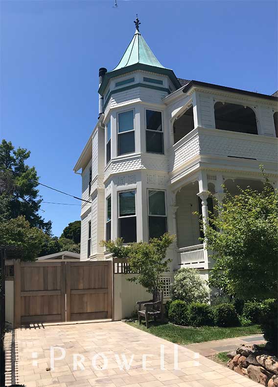 wood driveway gate 19 with victorian house