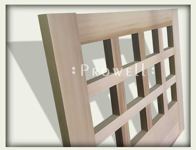 Cropped photograph showing the wooden entrance gates #5-2