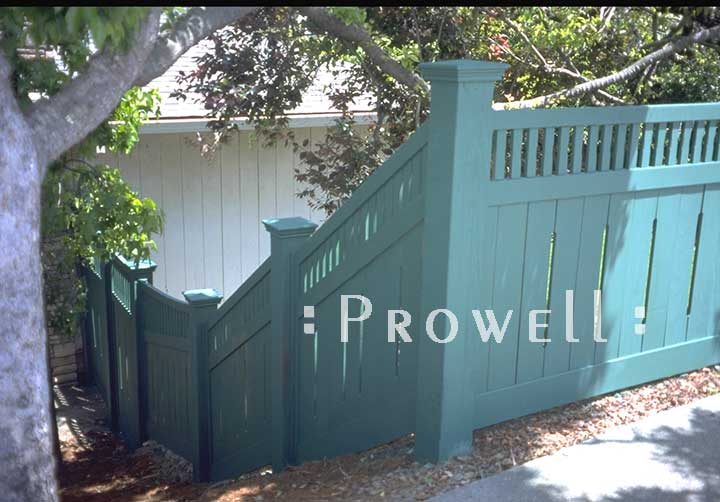 custom wood fences on a hill