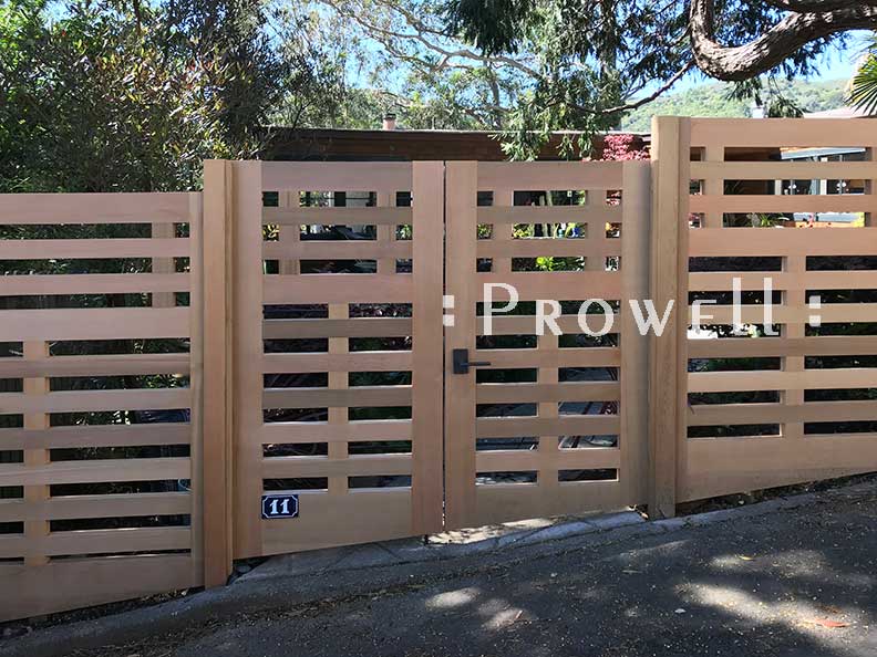 double wood gates on a slope. Prowell