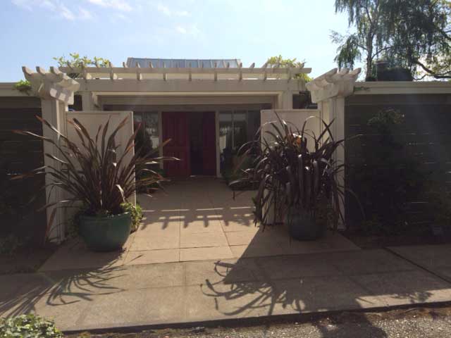 site photograph featuring the double wood gates #114-2 in Seattle, Washingtongarden entry in Seattle, WA