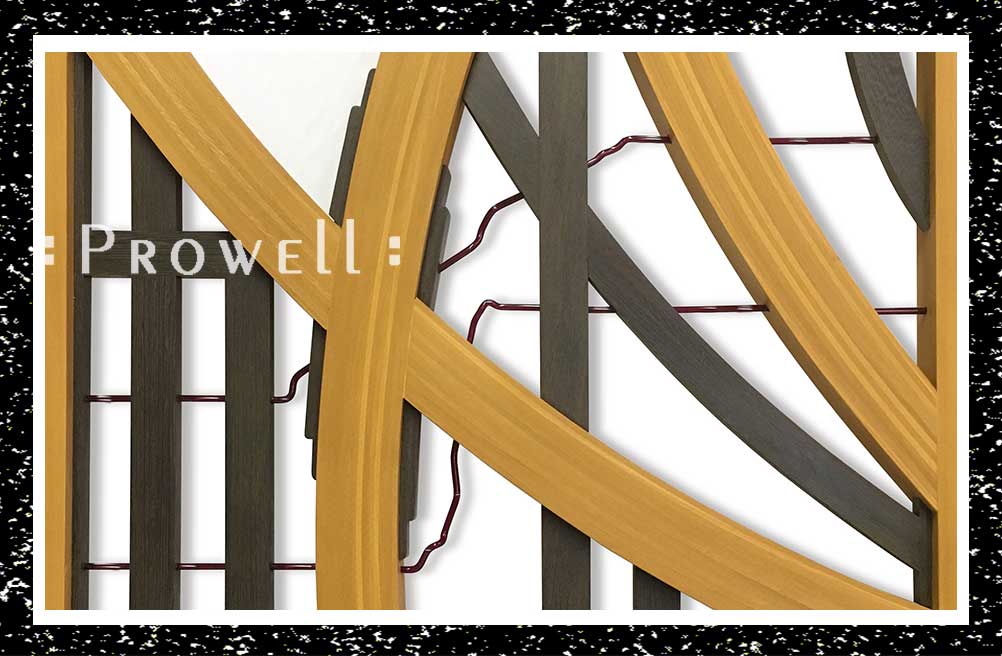 cropped photo showing the meandering acrylic rod of the artistic wood gates #200-A