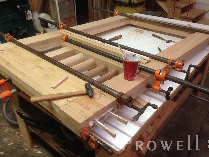 shop photo showing the partial assembly of the unusual garden gate #208