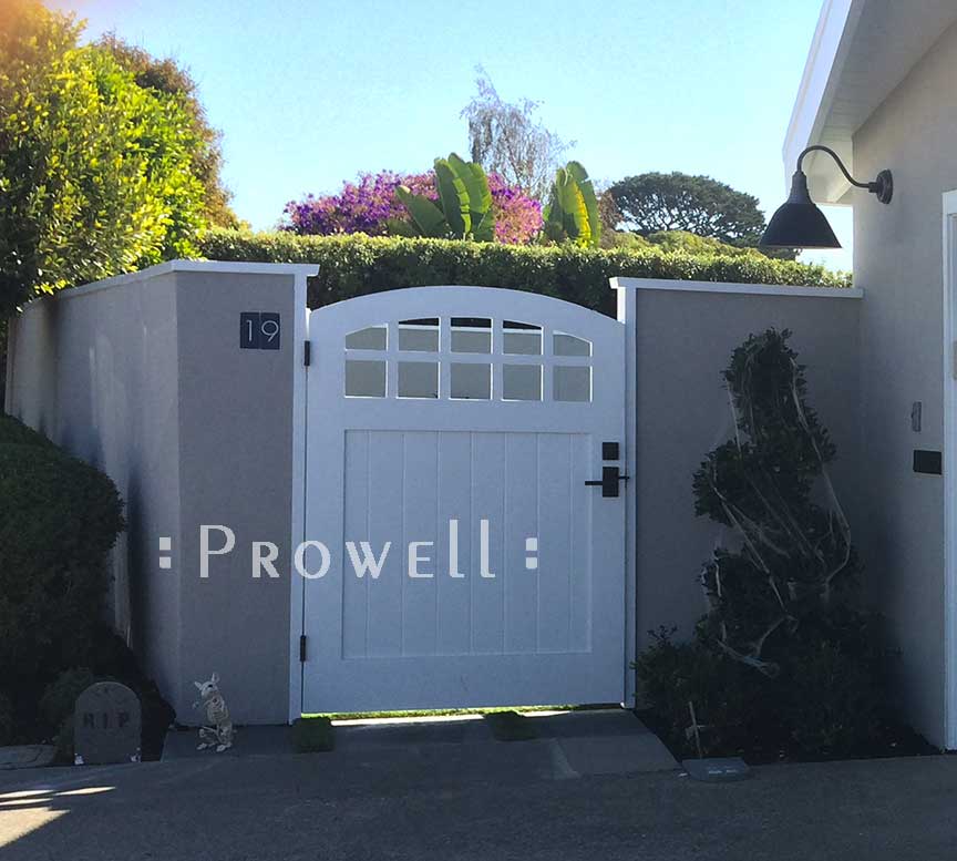 showing the arching wood gate 20-20 in Belvedere, California