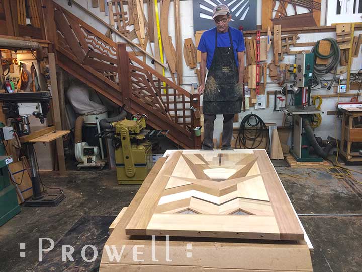 Shop photo showing charles with the nearly completed amazing gate #217