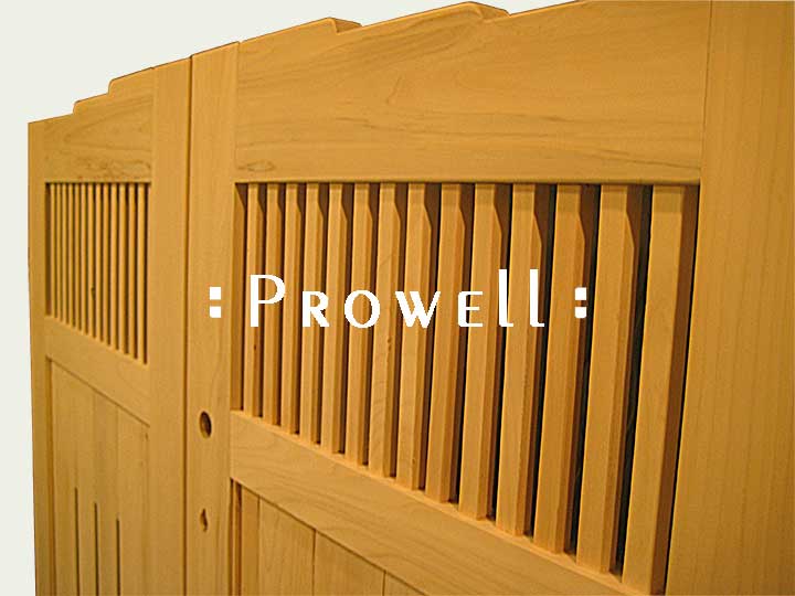 cropped photo close-up showing wood gate #24