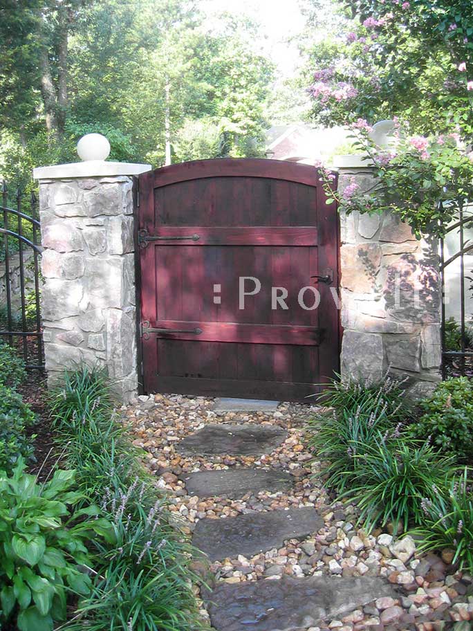 Photograph of the garden and arched wood gate 29 in Little Rock, Arkansas