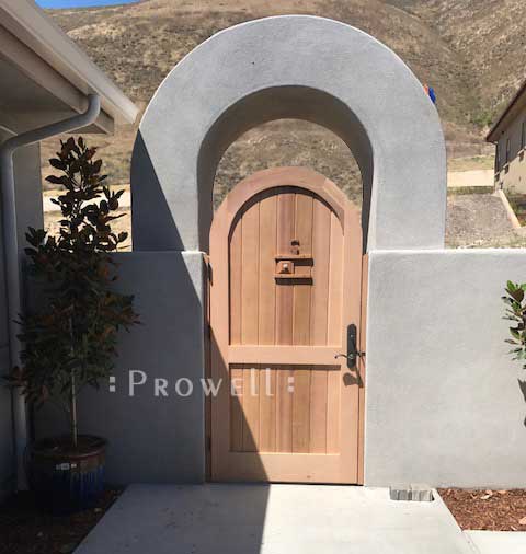 Photo showing gate 31-6 with a 180 degree arch in Pismo Beach, Californiawood arched garden gate in Pismo beach