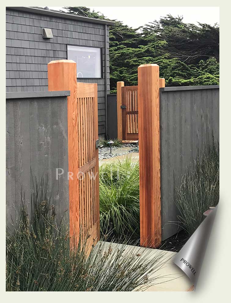 site photograph showing two outdoor gates #40-3 in Sea Ranch. Stained cedar contrasting to the gray house stain at Sea Ranch, california.