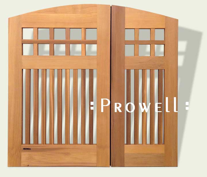 cropped image showing arched wood gate #53-5