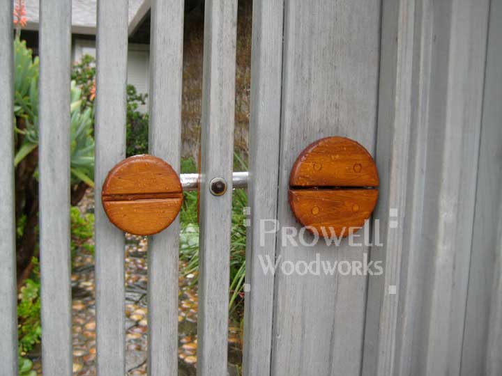 site photo showing Prowell's teak and stainless steel gate latch.