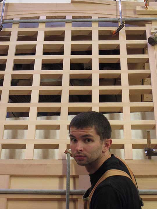shop photograph showing Ben Prowell building the dual swing gate #77