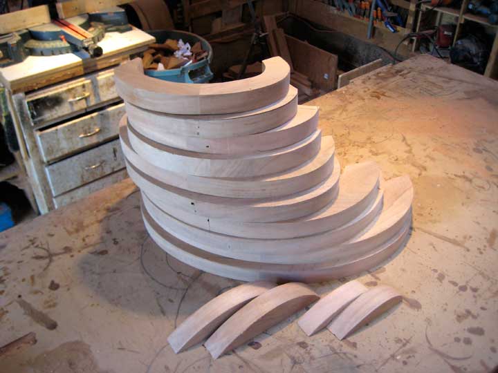 Shop photograph showing the completed wood ovals for the modern wooden gate design #203