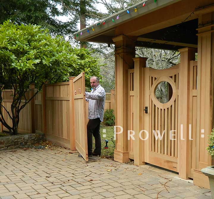 Brian Van Rheenan installing fence panels