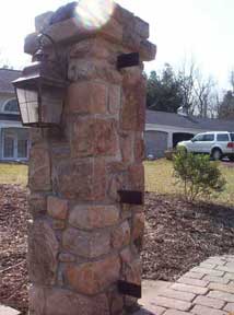 hanging driveway gates from stone