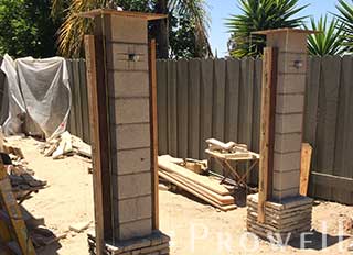 embedding wood jambs into stone gate columns