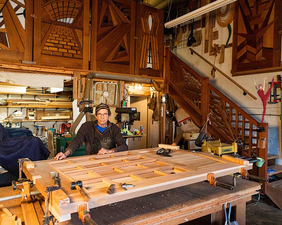 photo showing charles in the shop building the wood entrance gate #110 3110