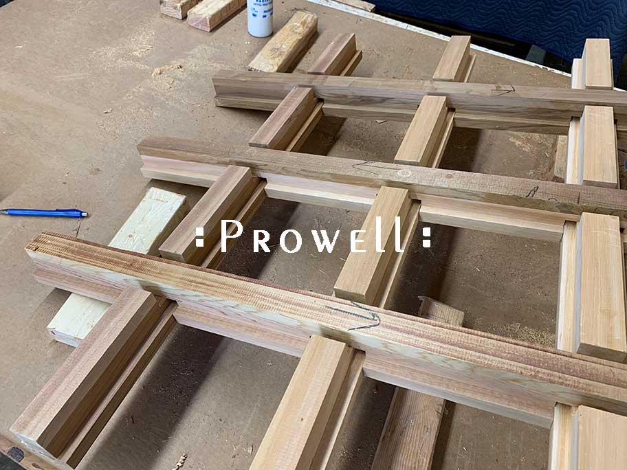 shop photograph showing the joinery for how to build the wooden gate entrance half-laps for #110