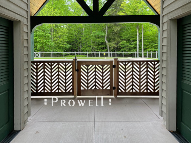 site photograph showing wood garden gate #11-3 and fence panels in New York. Prowell