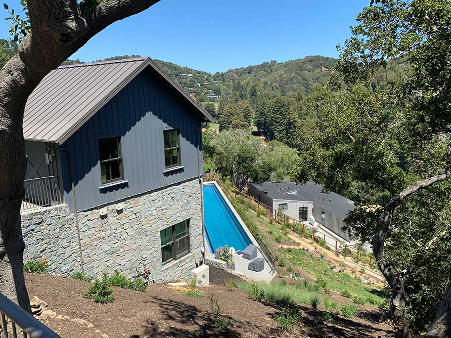 site photo showing the residence and surrounding landscape