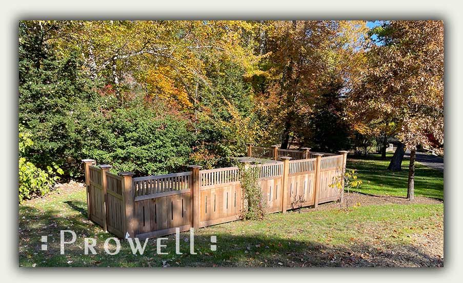 wood garden fence HVAC and trash enclosure